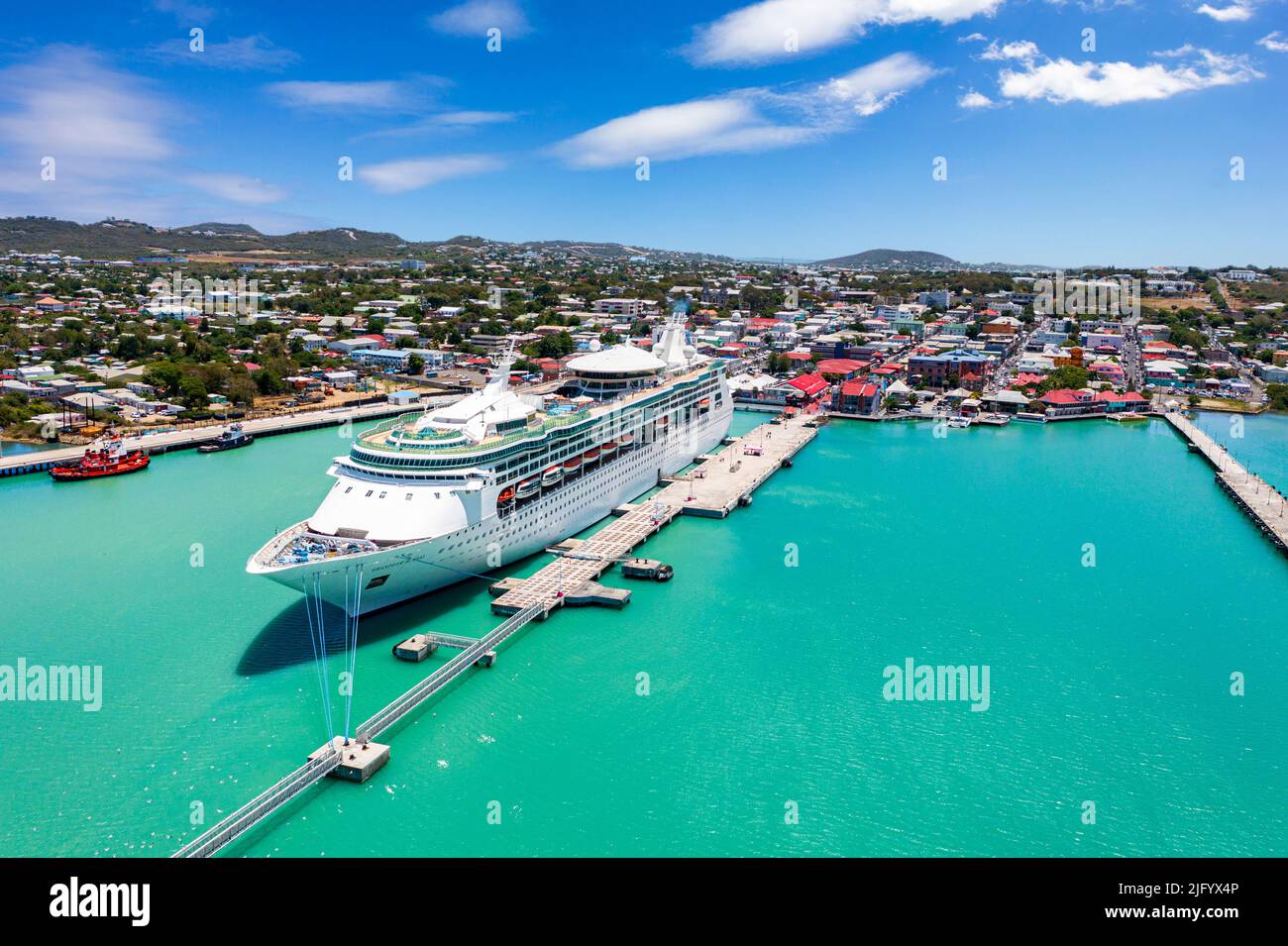 Aerial view of cruise ship moored in the touristic port of St. Johns, Antigua, Leeward Islands, West Indies, Caribbean, Central America Stock Photo