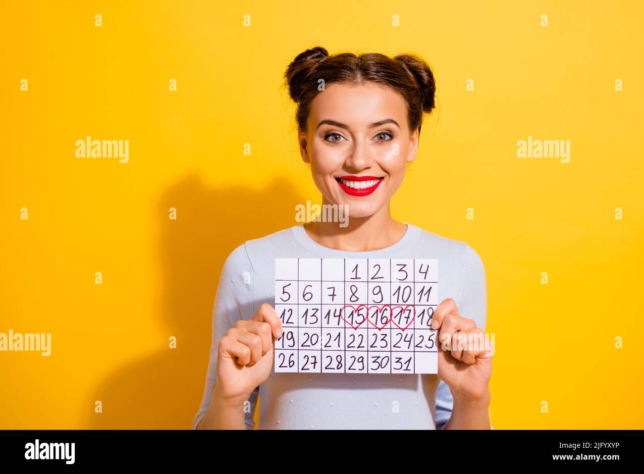 Photo of cheerful sweet lady wear long sleeve looking showing calendar