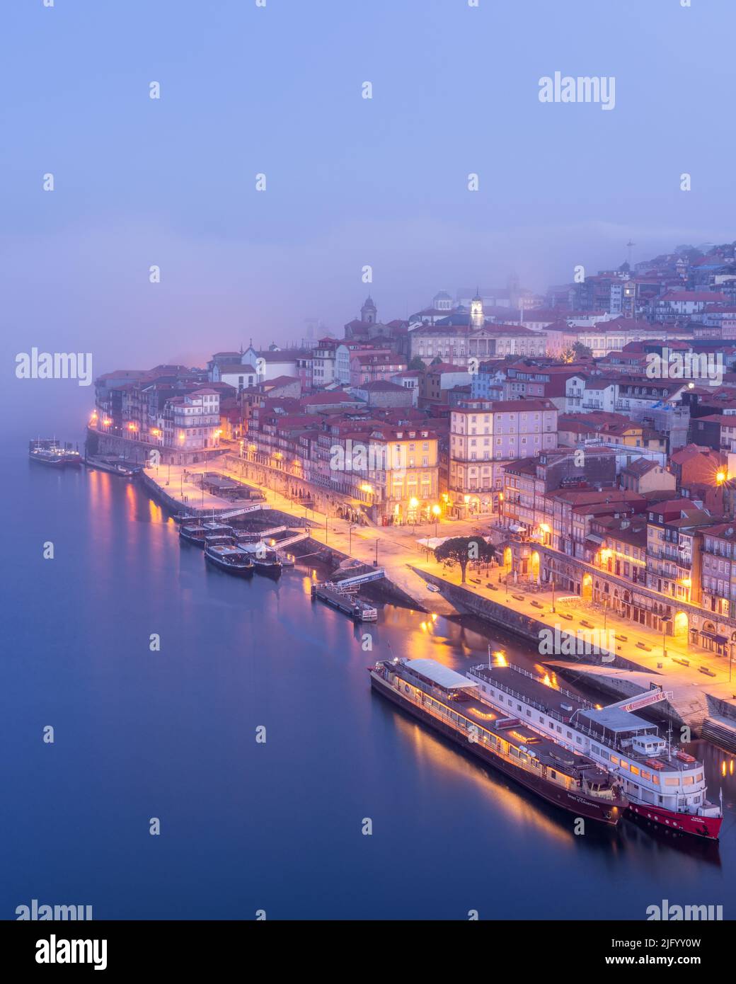 Porto with an early morning sea fog in the background, Porto, Portugal, Europe Stock Photo