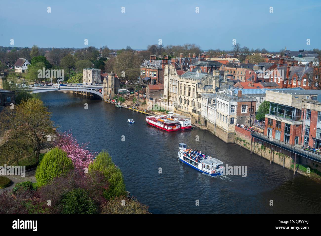 York river boat cruise on the River Ouse and Lendal bridge, York city centre, North Yorkshire, England, United Kingdom, Europe Stock Photo