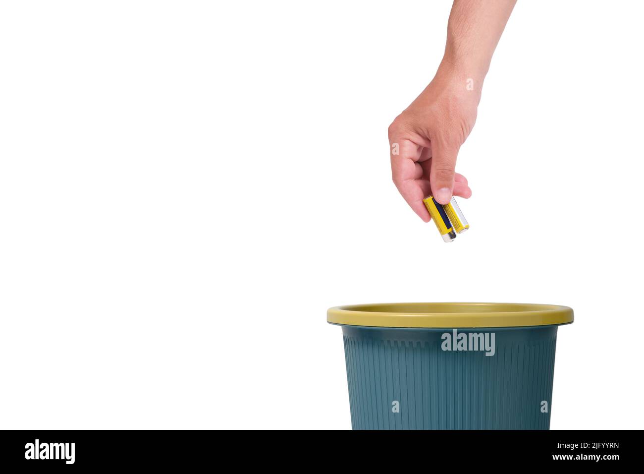Throwing old used batteries in trash, on white background Stock Photo