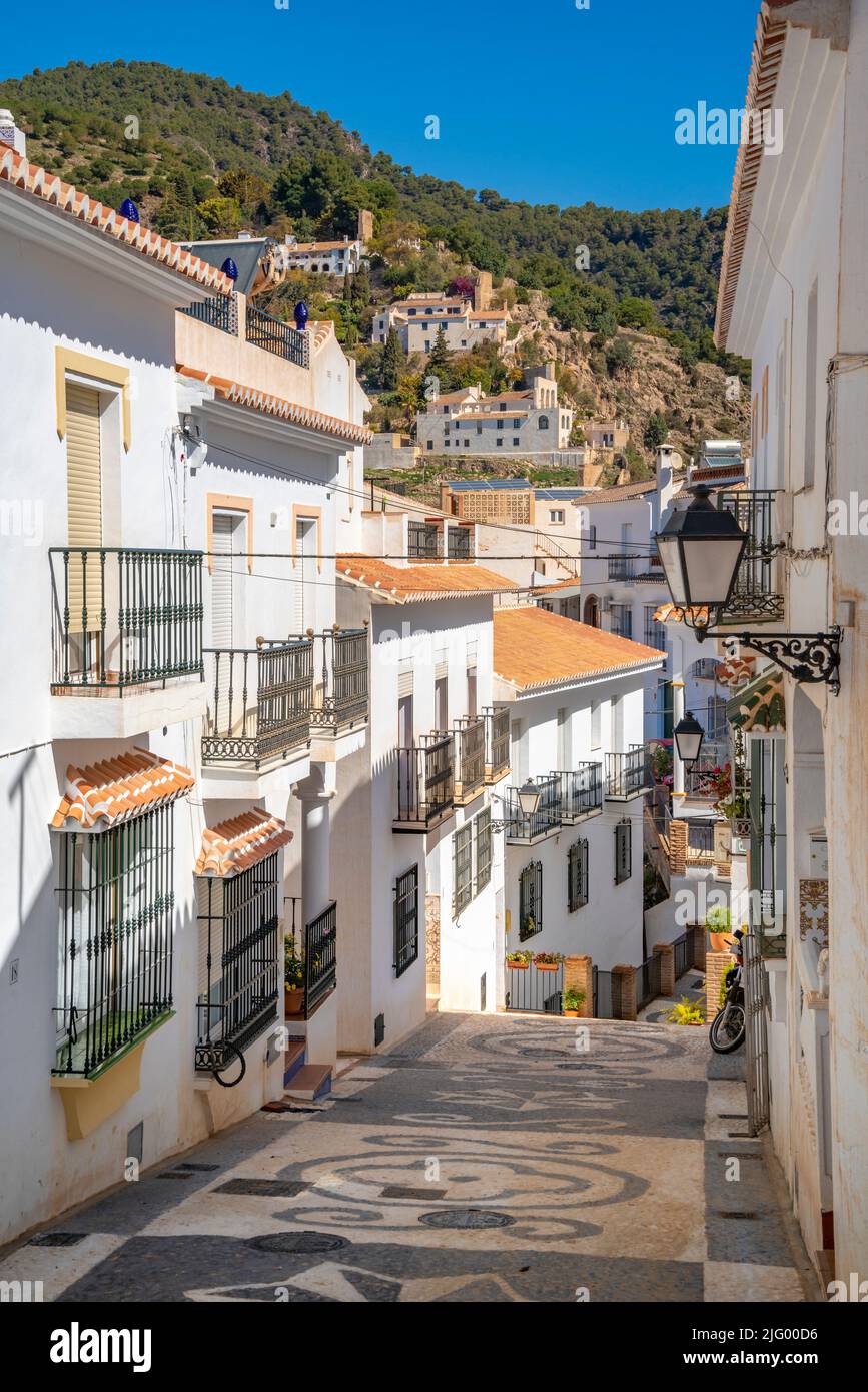 View of whitewashed houses and mountains in background, Frigiliana, Malaga Province, Andalucia, Spain, Mediterranean, Europe Stock Photo