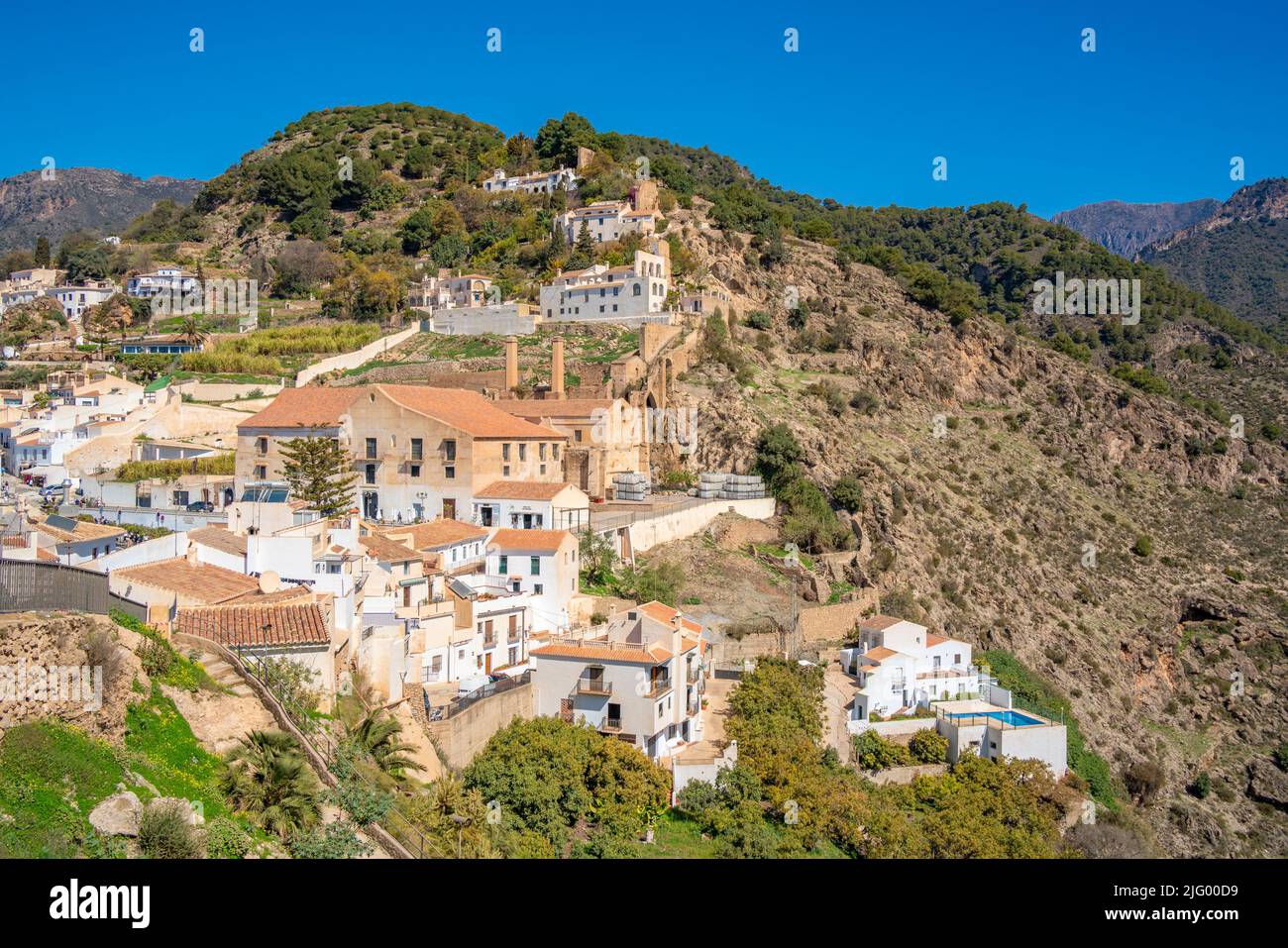 View of whitewashed houses and mountains in background, Frigiliana, Malaga Province, Andalucia, Spain, Mediterranean, Europe Stock Photo