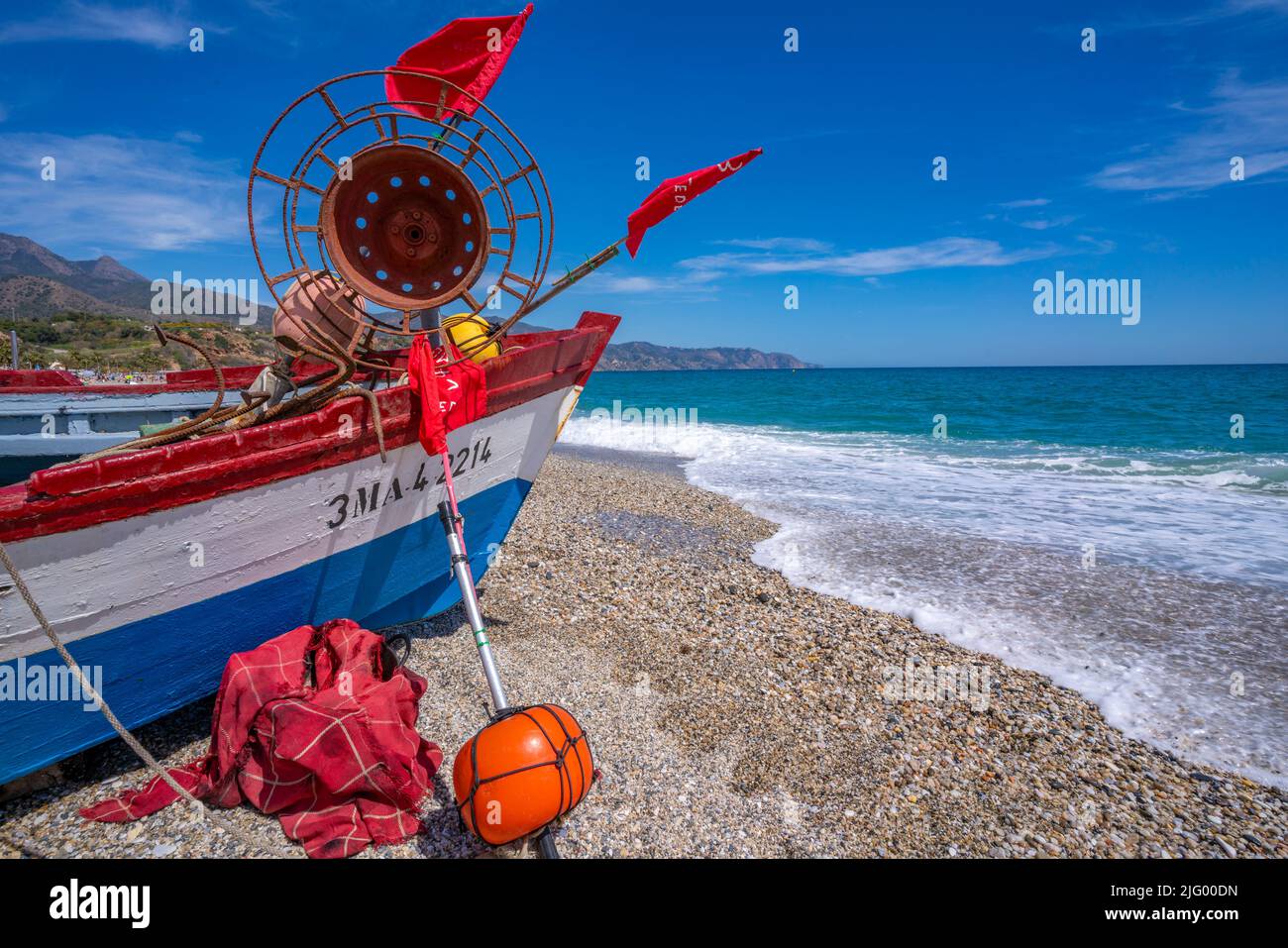 View of boat on Playa de Burriana beach in Nerja, Costa del Sol, Malaga Province, Andalusia, Spain, Mediterranean, Europe Stock Photo