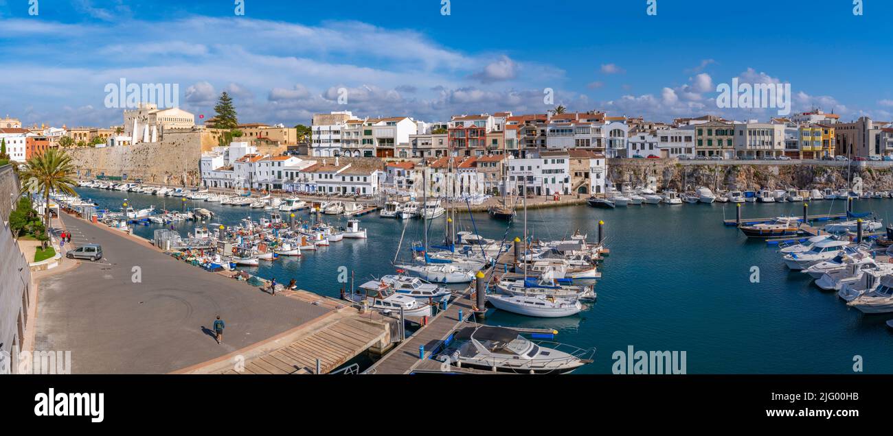 View of boats in marina and whitewashed houses from elevated position, Ciutadella, Menorca, Balearic Islands, Spain, Mediterranean, Europe Stock Photo