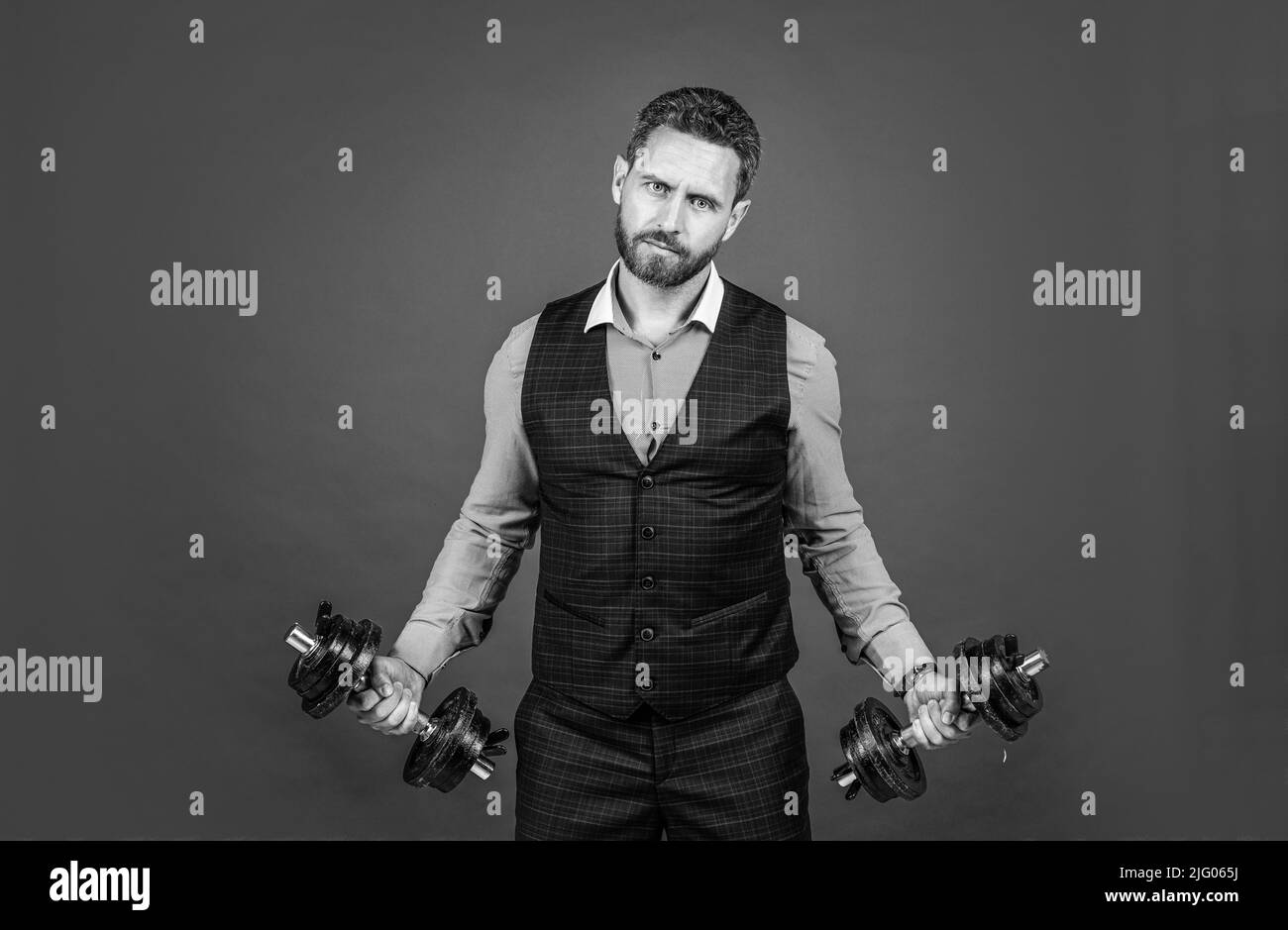 No pain no gain. Businessman lift hand weights red background. Business training. Muscle