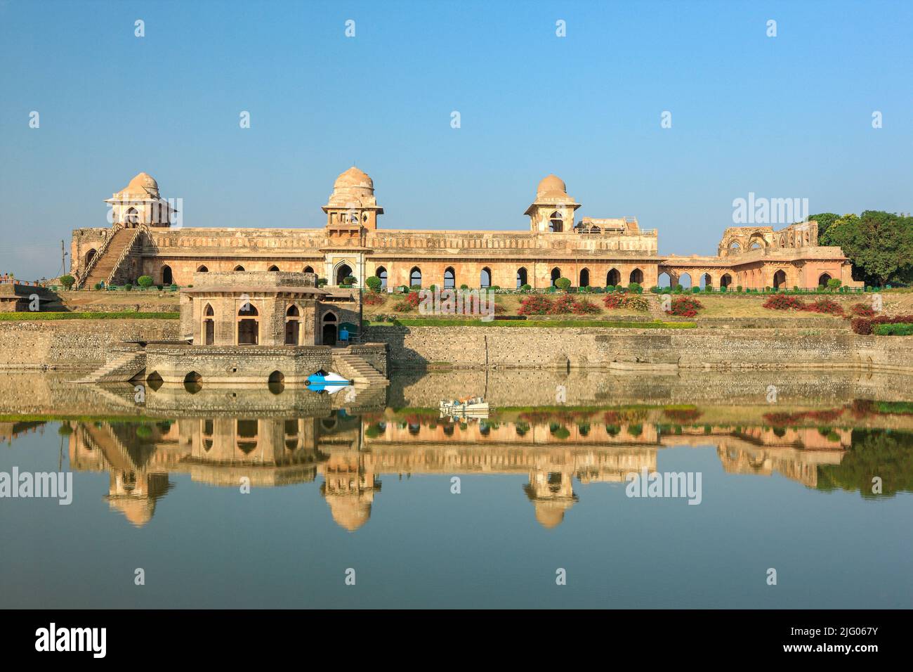 Mandu, 15,February,2010 : Historical Jahaz Mahal ,Ship Palace,15th Century ,reflected in Kapur Tank , Mandu, District Dhar, Madhya Pradesh, India Stock Photo