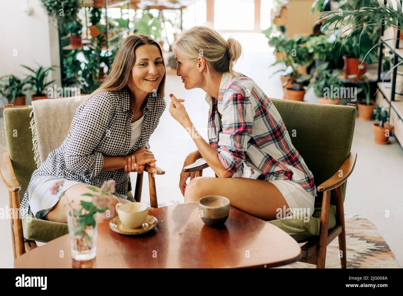 Two women in cafe having a drink hi-res stock photography and images ...