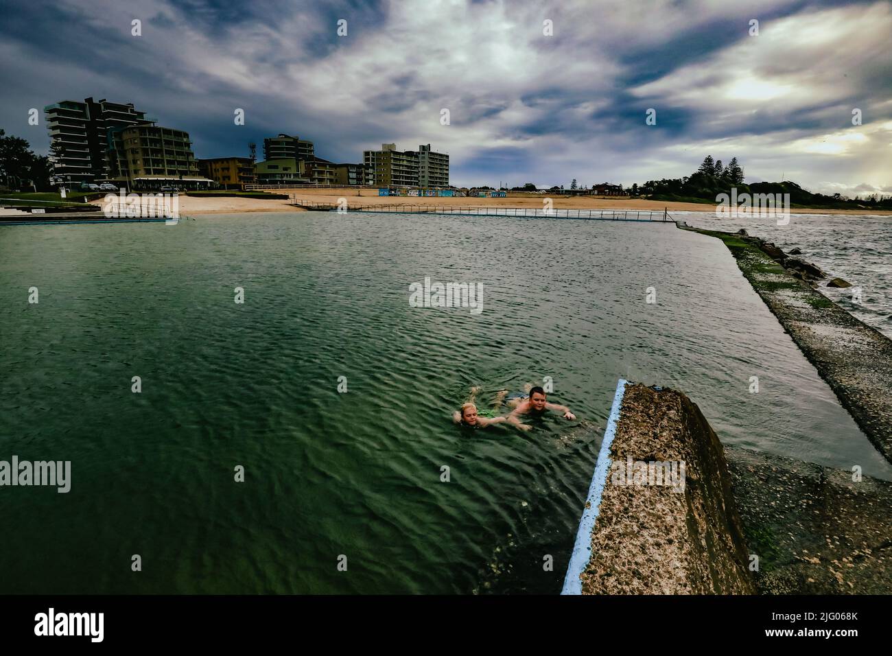 Kids swimming in the Ocean Baths swimming pool at Forster, New South