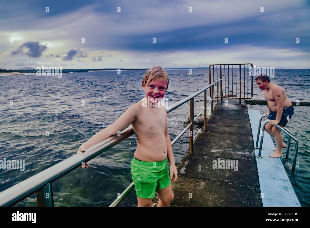 Kids swimming in the Ocean Baths swimming pool at Forster, New South