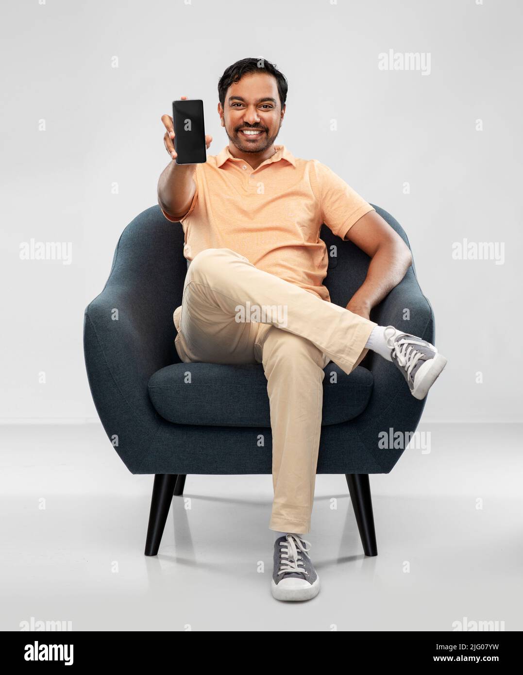 Indian young man showing blank hi-res stock photography and images - Alamy
