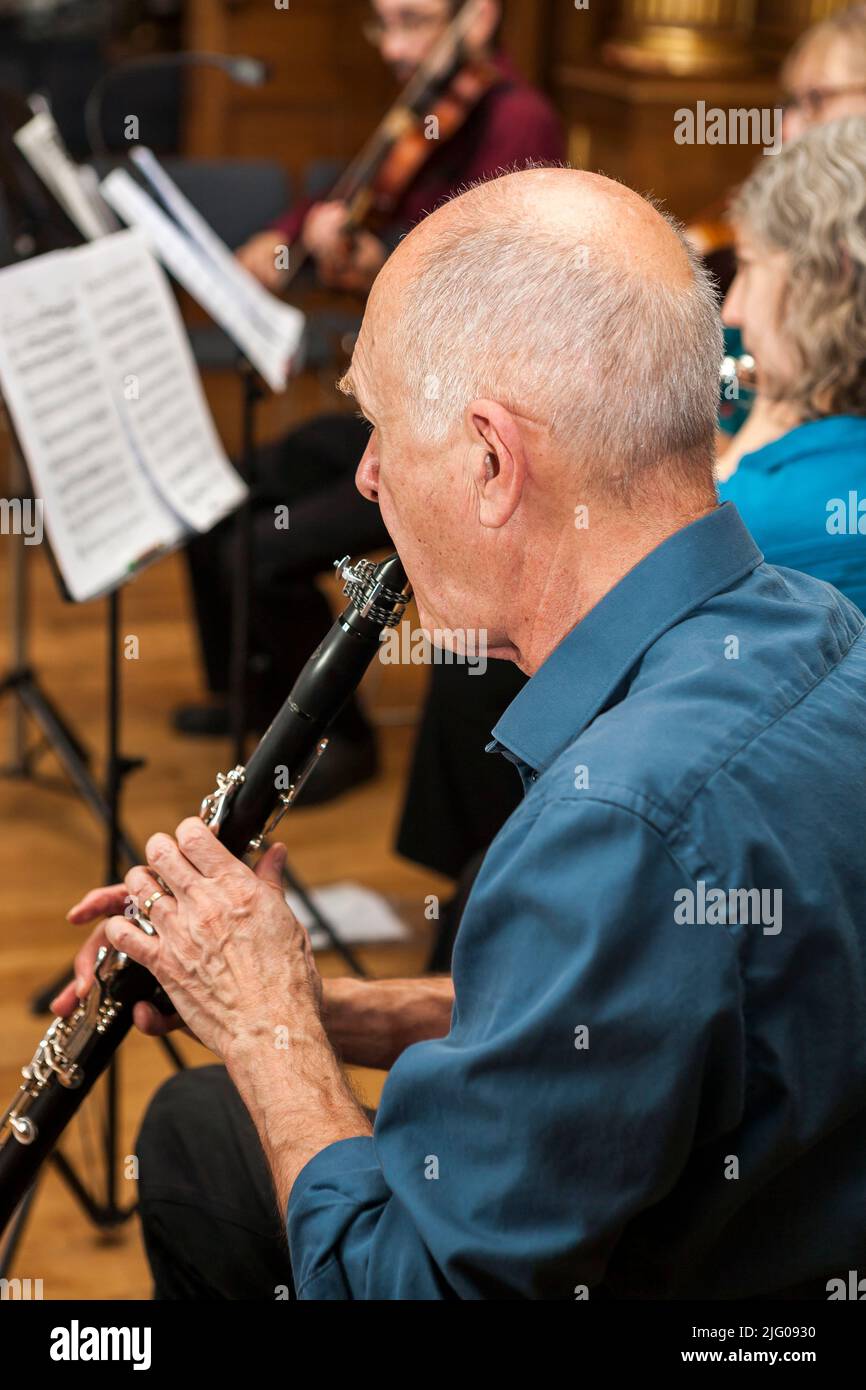 Clarinettist playing in the CoMA (Contemporary Music for All) Sussex group in West Dean College, West Sussex, UK Stock Photo