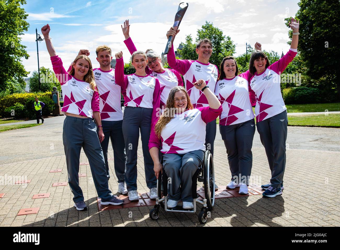 Windsor and Eton, UK. 6th July, 2022. Batonbearers pose in front of