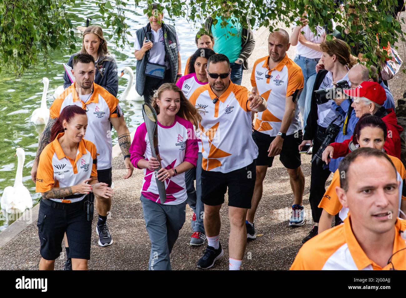 Windsor and Eton, UK. 6th July, 2022. Batonbearer Jemma Wood carries