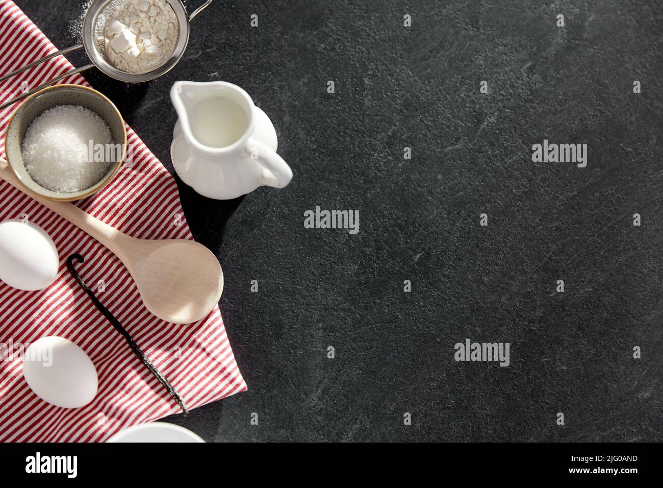 eggs, sugar, milk, flour, spoon and vanilla Stock Photo Alamy