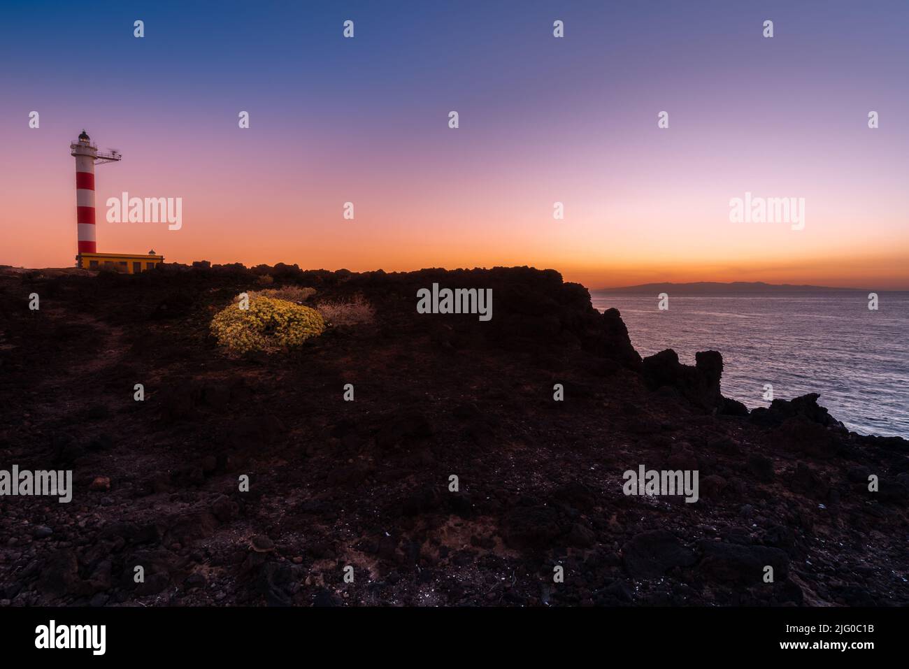 Lighthouse of Punta de Abona at sunrise, Tenerife Island, Spain Stock Photo