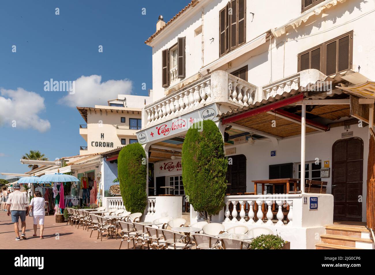 Cala Ratjada, Mallorca, Spain; June 25th, 2022: Traditional white houses on a Cala Ratjada waterfront promenade Stock Photo