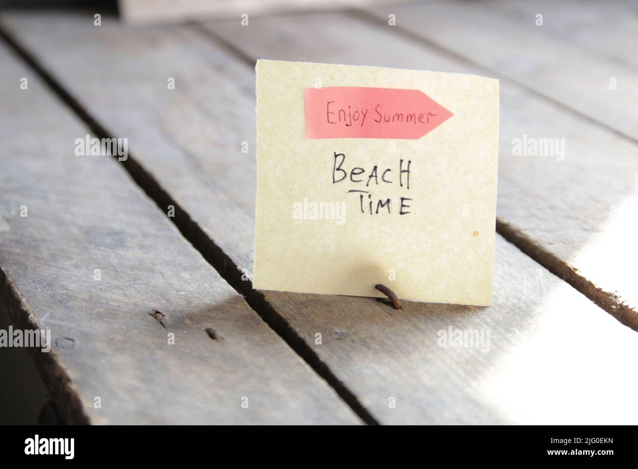 Beach time inscription and pointer. Creative summer concept. Stock Photo