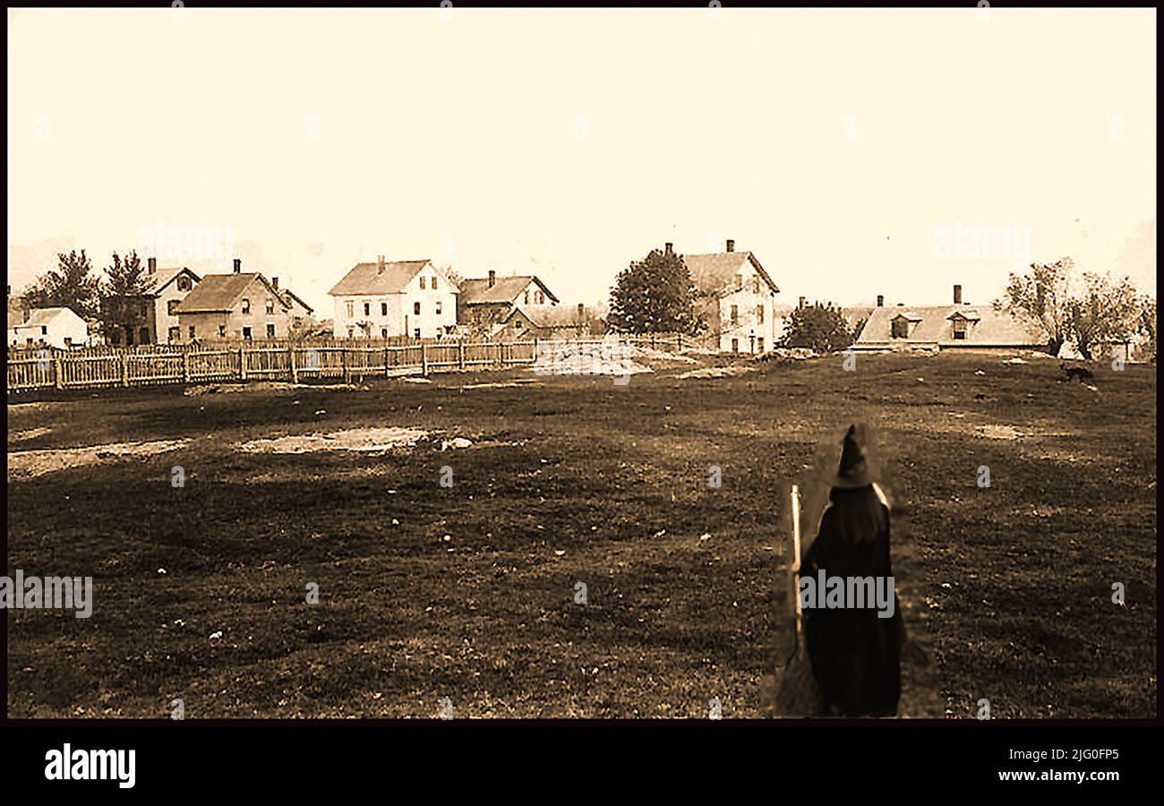 An early photograph of Gallows Hill, Salem, USA with a woman in witches clothing in the foreground. Gallows hill was long believed to be the site of the execution of witches during the Salem witch trial hysteria, however the Gallows Hill Project confirmed the belief  that Proctor’s Ledge, a small hill located between Proctor Street and Pope Street in Salem was the actual site,  in January  2016. The Salem witch trials ( hearings and prosecutions of people accused of witchcraft) took place between February 1692 and May 1693. More than two hundred people were accused. 30 were found guilty. Stock Photo