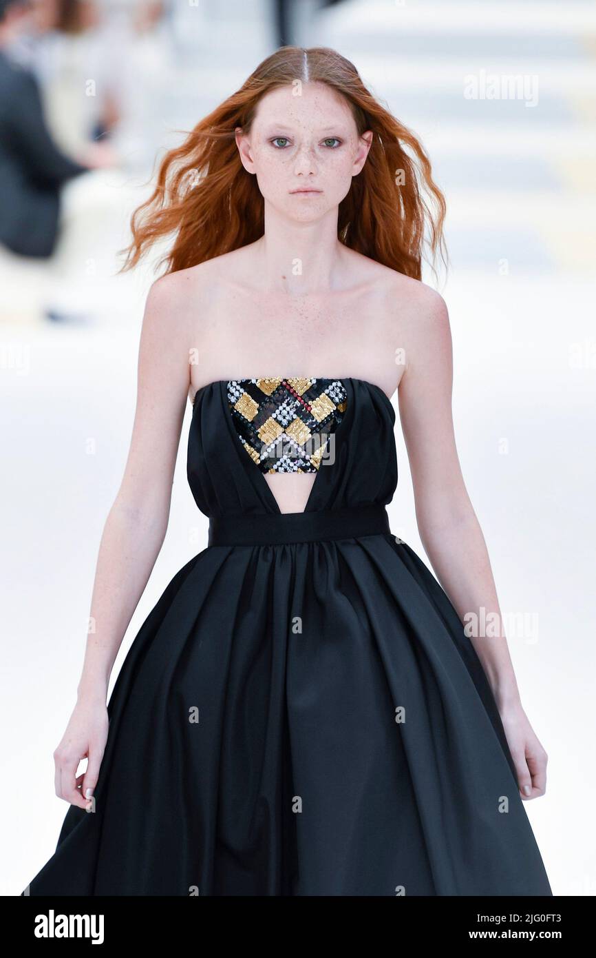 France. 05th July, 2022. Model walks on the runway during the Chanel Fall Winter 2022-2023 Haute Couture Fashion Show held in Paris, France on July 5, 2022. (Photo by Jonas Gustavsson/Sipa USA) France. 05th July, 2022. Model walks on the runway during the Chanel Fall Winter 2022-2023 Haute Couture Fashion Show held in Paris, France on July 5, 2022. (Photo by Jonas Gustavsson/Sipa USA)
