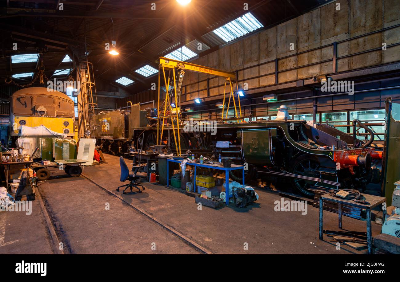 A steam engine undergoing a rebuild in the engine sheds at Grosmont Stock Photo