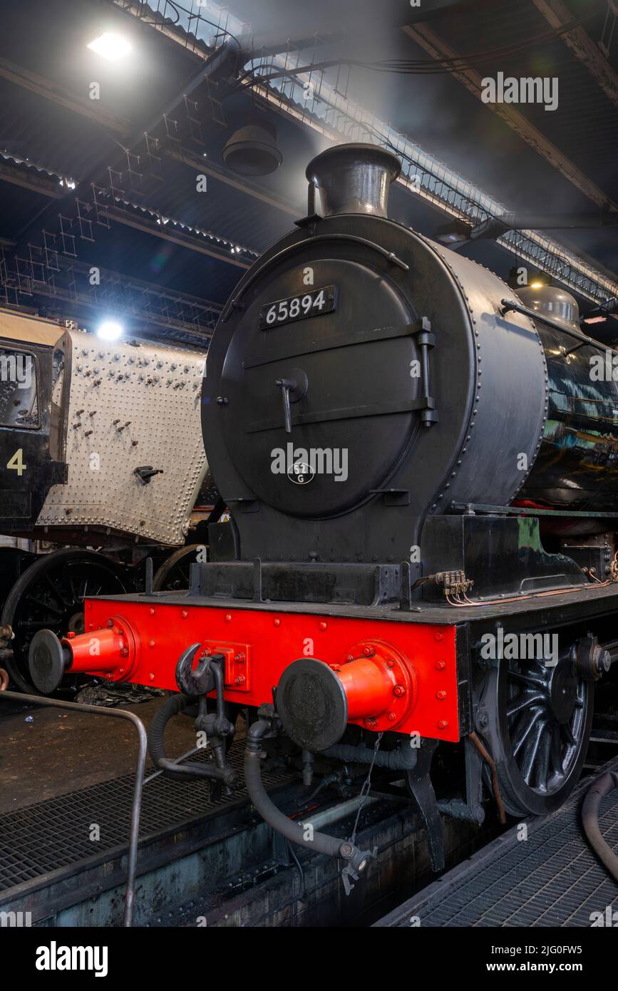P3 Engine No. 65894 'steaming down' in the engine shed at Grosmont Stock Photo