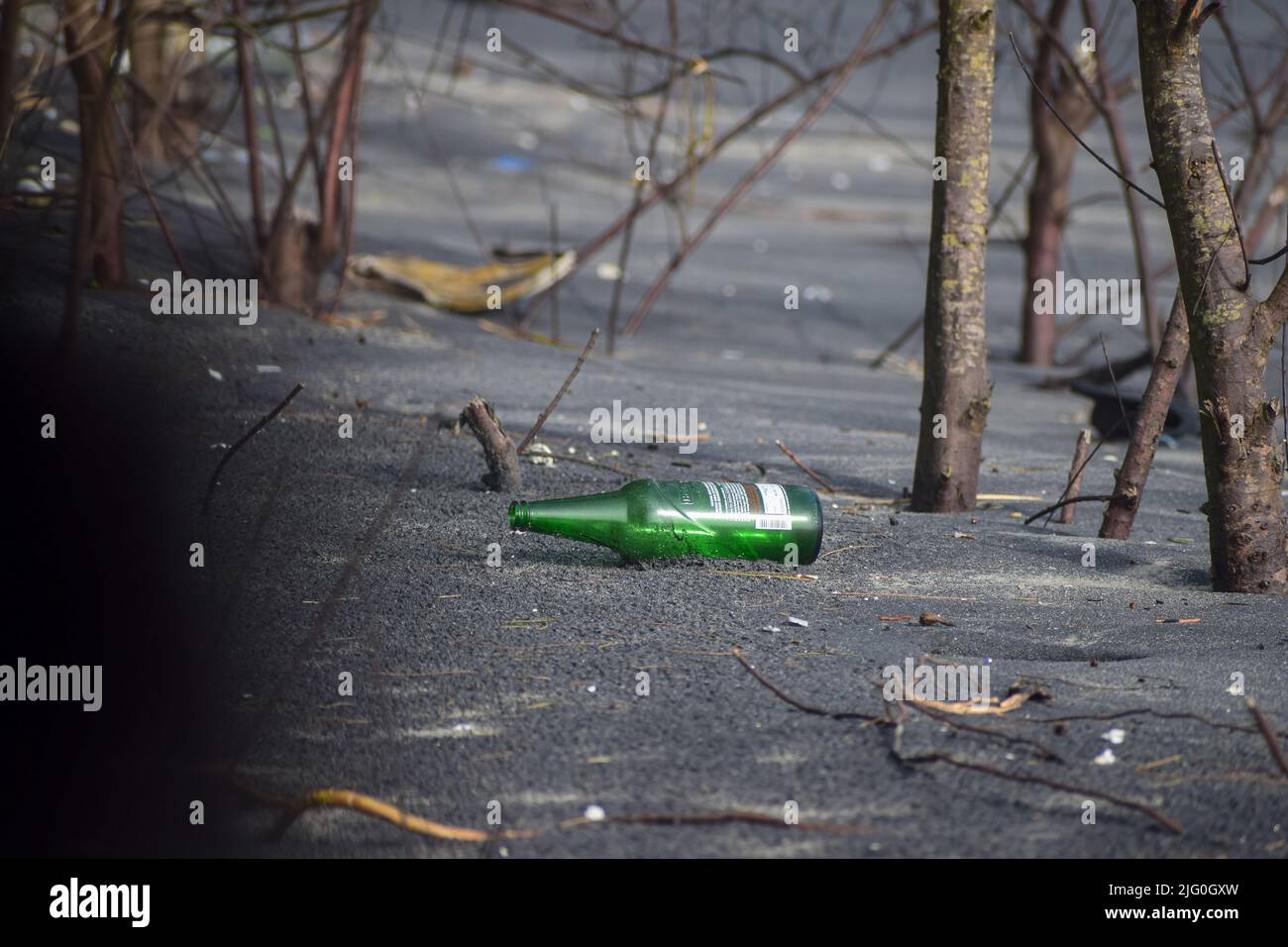 Beer Rings Polution Empty beer bottles at beach which causes marine pollution Stock Photo ...