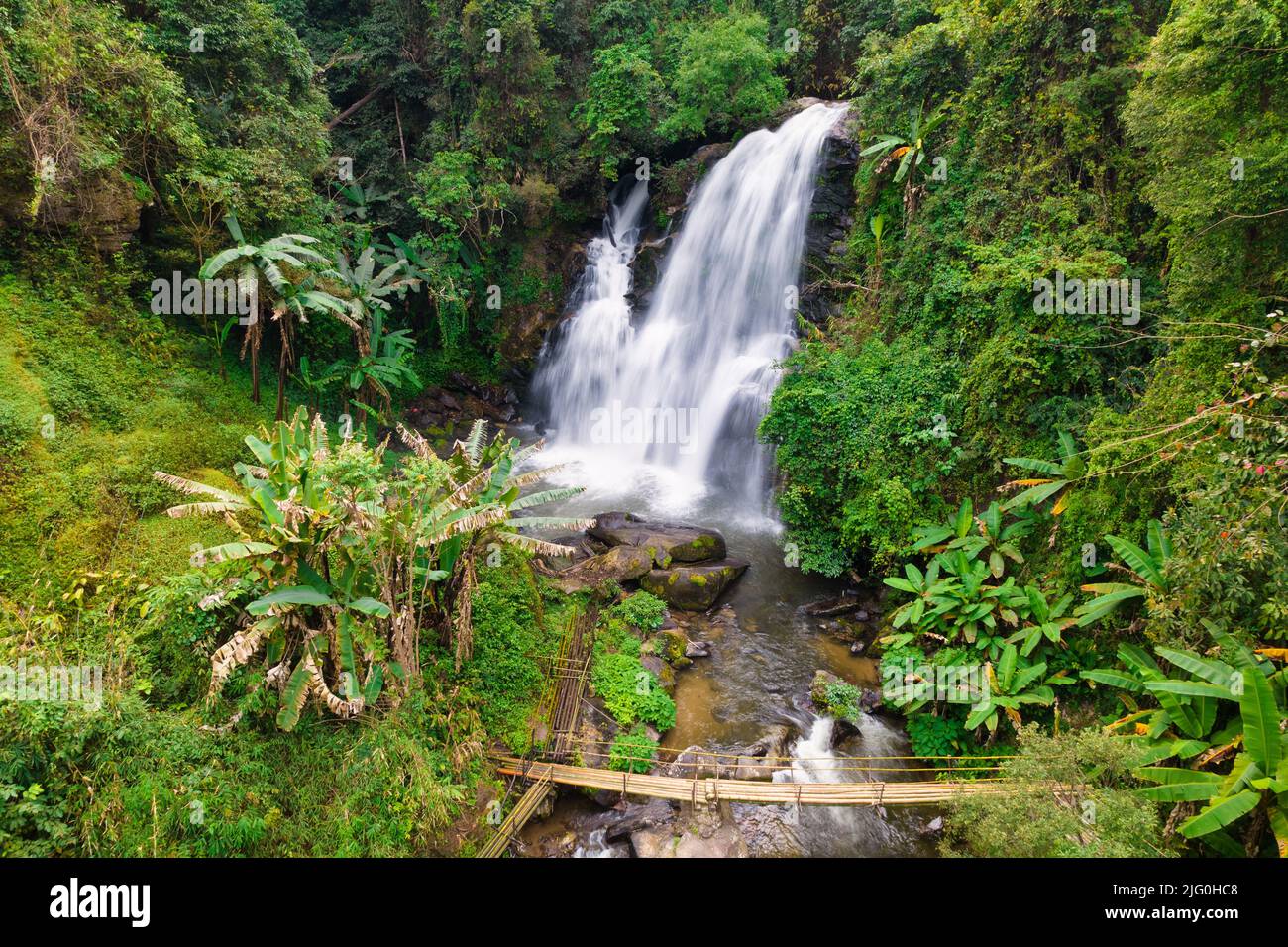 Aerial shot of a large waterfall in the tropical forest of Doi Inthanon, Thailand Stock Photo