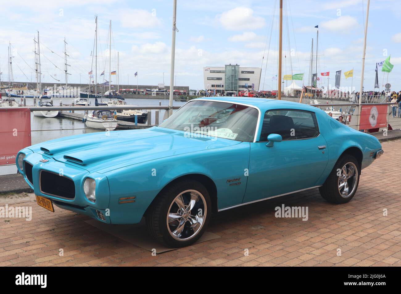 blue american muscle car Pontiac Firebird Formula 400 on old timer day in dutch city Lelystad, the Netherlands - June 19 2022 Stock Photo