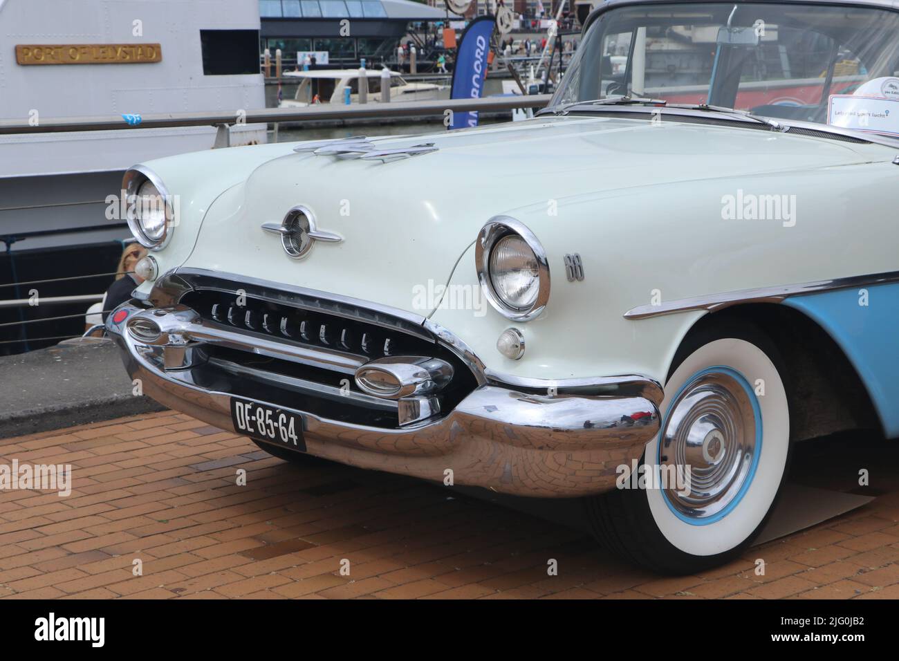 front of classic fifties american Oldsmobile car on old timer day in dutch city Lelystad, the Netherlands Stock Photo