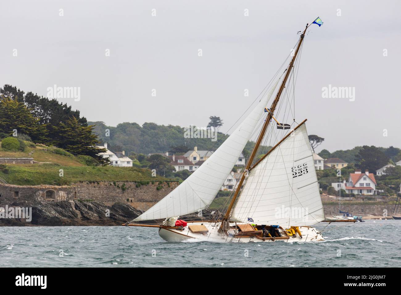 Large Classic wooden vessels, including Bristol Pilot Cutters, race in Carrick Roads in 32knots of wind (half gale) during Falmouth Classics Regatta Stock Photo
