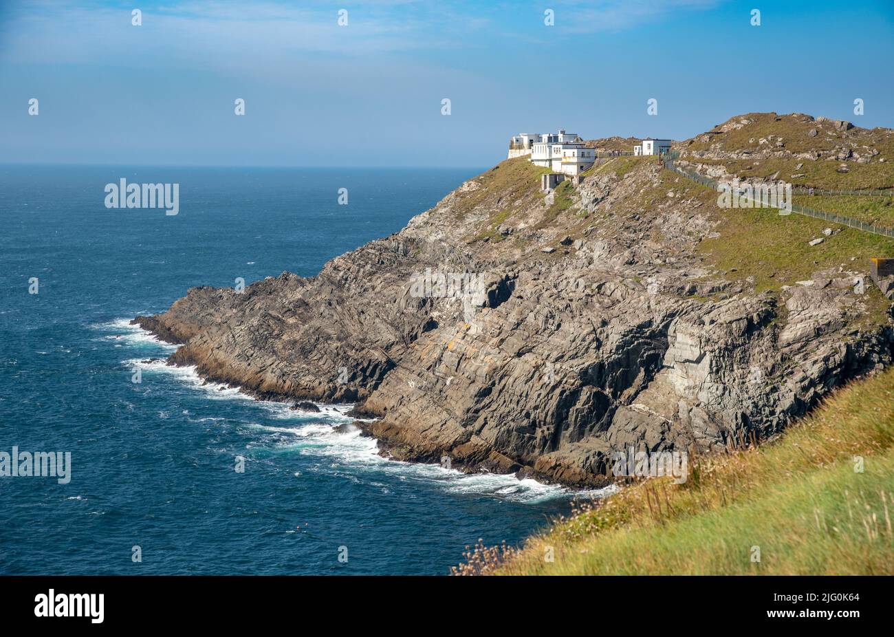 Mizen Head Signal Station lighthouse with dramatic rocky coastline in the Atlantic ocean . County Cork, Ireland. Stock Photo