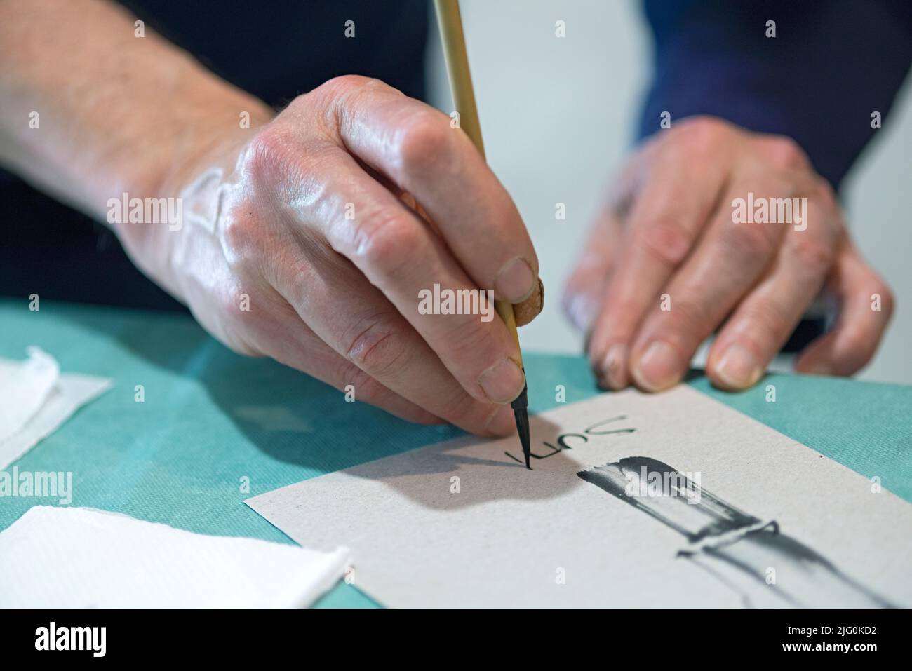 Sumie Artist Hand With a Brush Painting Stock Photo Alamy