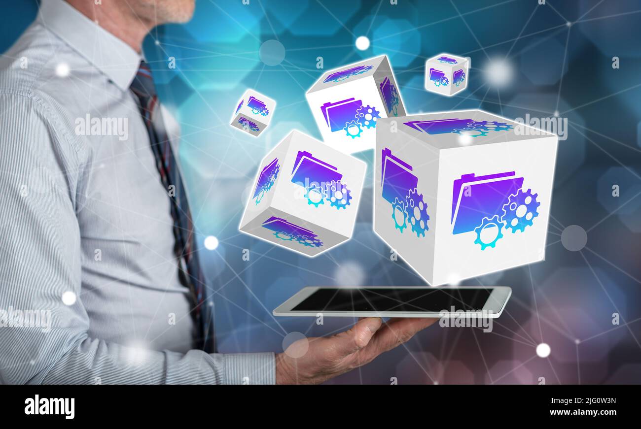 Document management concept above a tablet held by a man Stock Photo
