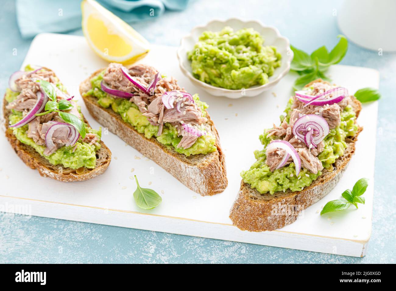 Toasts with canned tuna and avocado guacamole. Healthy food, diet