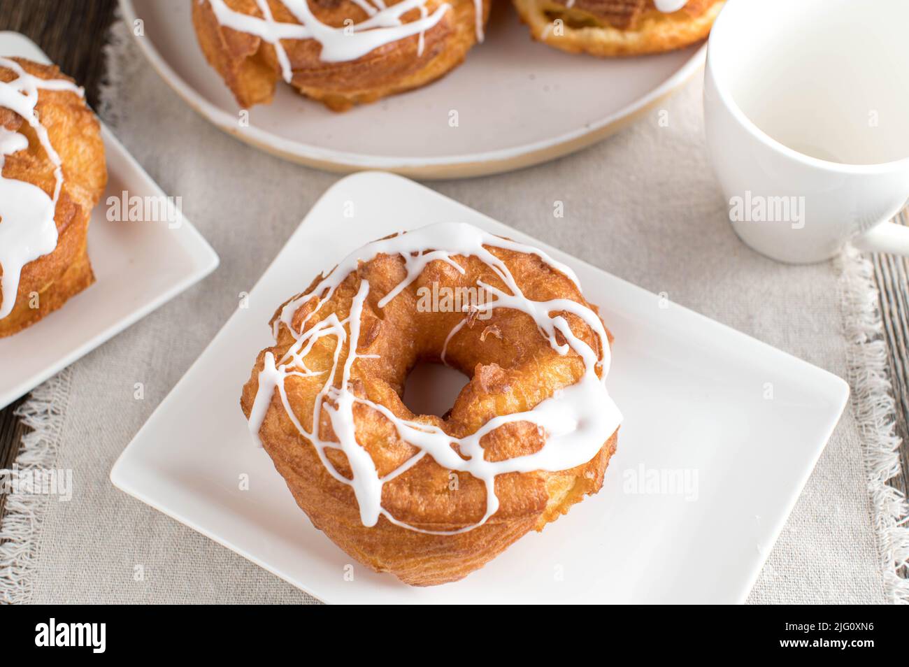 Deep fried choux pastry with glazed icing Stock Photo