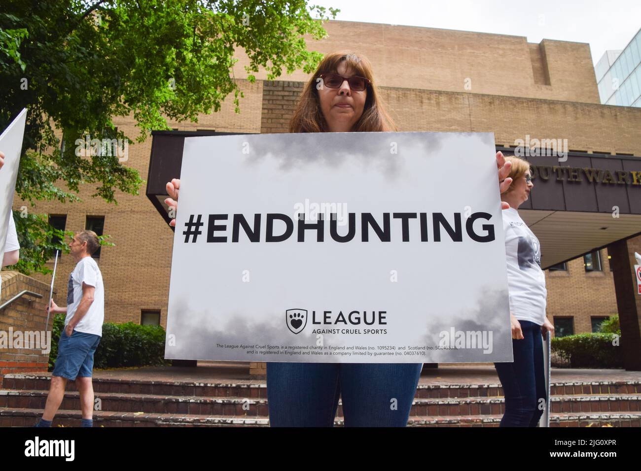 London, England, UK. 6th July, 2022. Activists gathered outside Southwark Crown Court in protest against fox hunting and called for the Hunting Act to be strengthened as the appeal hearing for Mark Hankinson begins. Hankinson was found guilty of encouraging or assisting others to use ''trail hunting'' as a cover for illegally chasing and killing foxes. (Credit Image: © Vuk Valcic/ZUMA Press Wire) Stock Photo