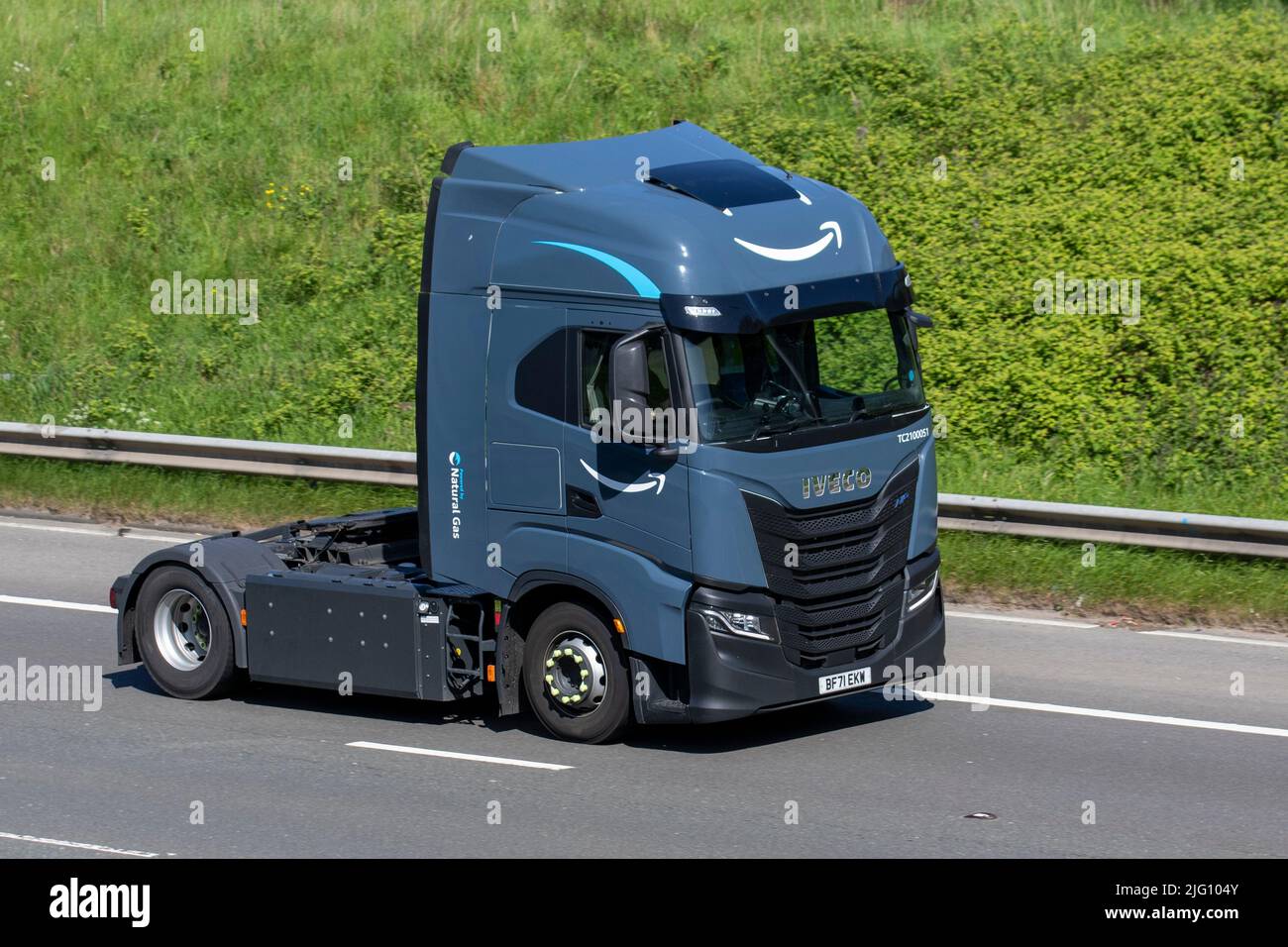 2021 grey IVECO STRALIS AS440S46T/P LNG S-A AS440S46T/P LNG AMAZON Natural  Gas powered truck; driving on the M6 Motorway, Manchester, UK Stock Photo -  Alamy