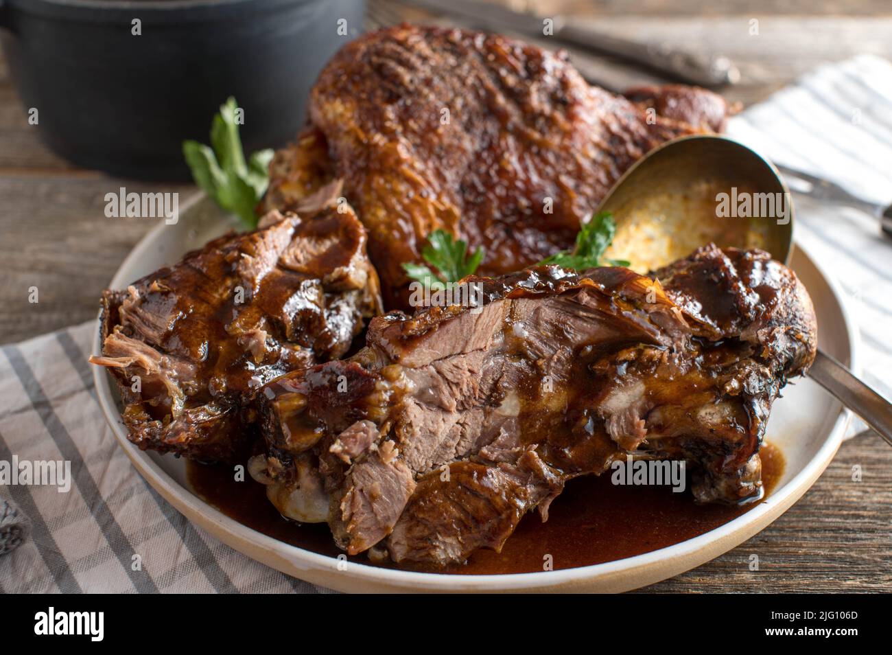 Roast turkey shanks with brown gravy Stock Photo Alamy