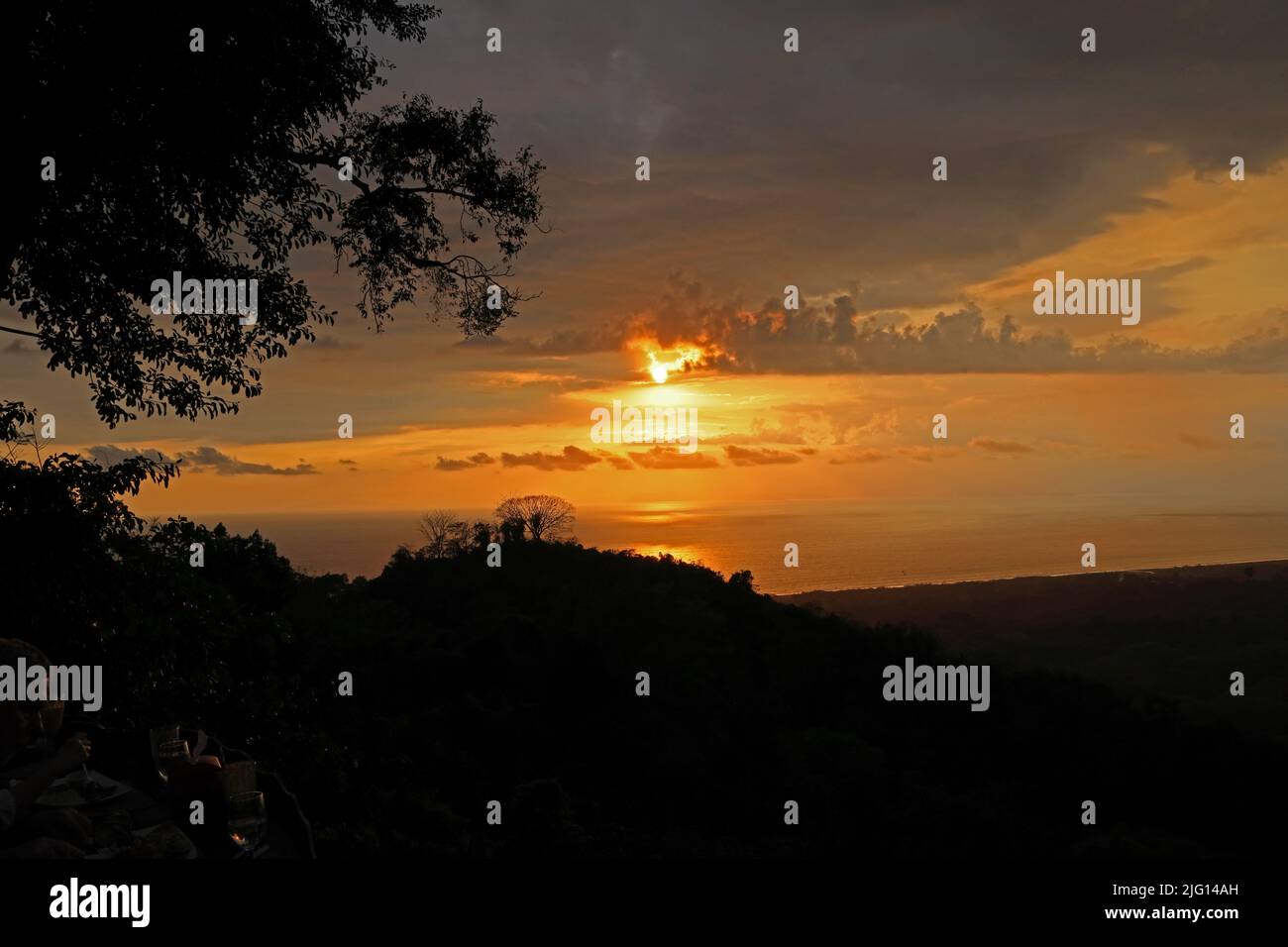 sunset over the rainforest to the sea  Carara, Costa Rica,           March Stock Photo