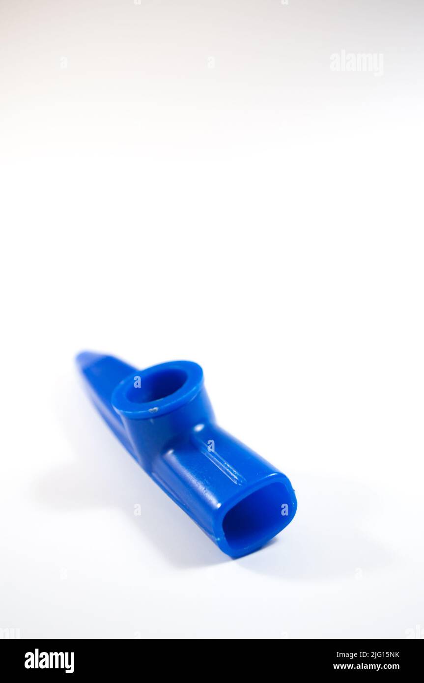 Blue kazoo, kazoo is a wind instrument. isolated on white background