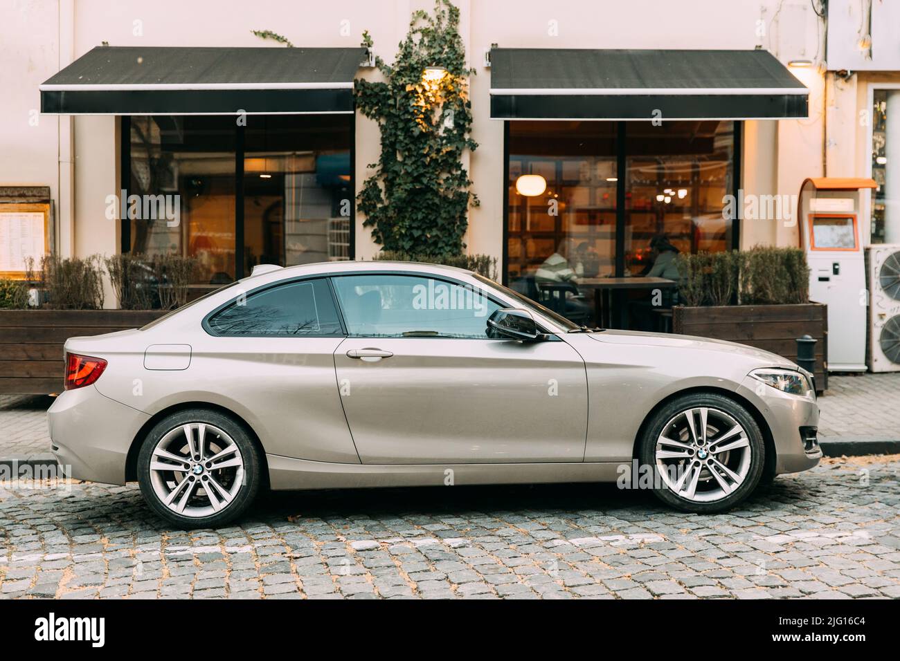 https://c8.alamy.com/comp/2JG16C4/tbilisi-georgia-march-28-2022-view-of-white-bmw-2-series-f22-german-executive-car-fast-modern-2-door-coupe-parked-on-street-of-tbilisi-2JG16C4.jpg