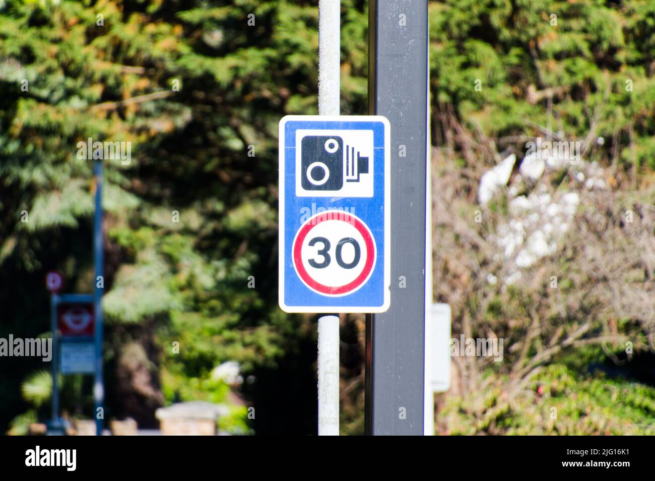 30mph Speed camera in built-up road Stock Photo