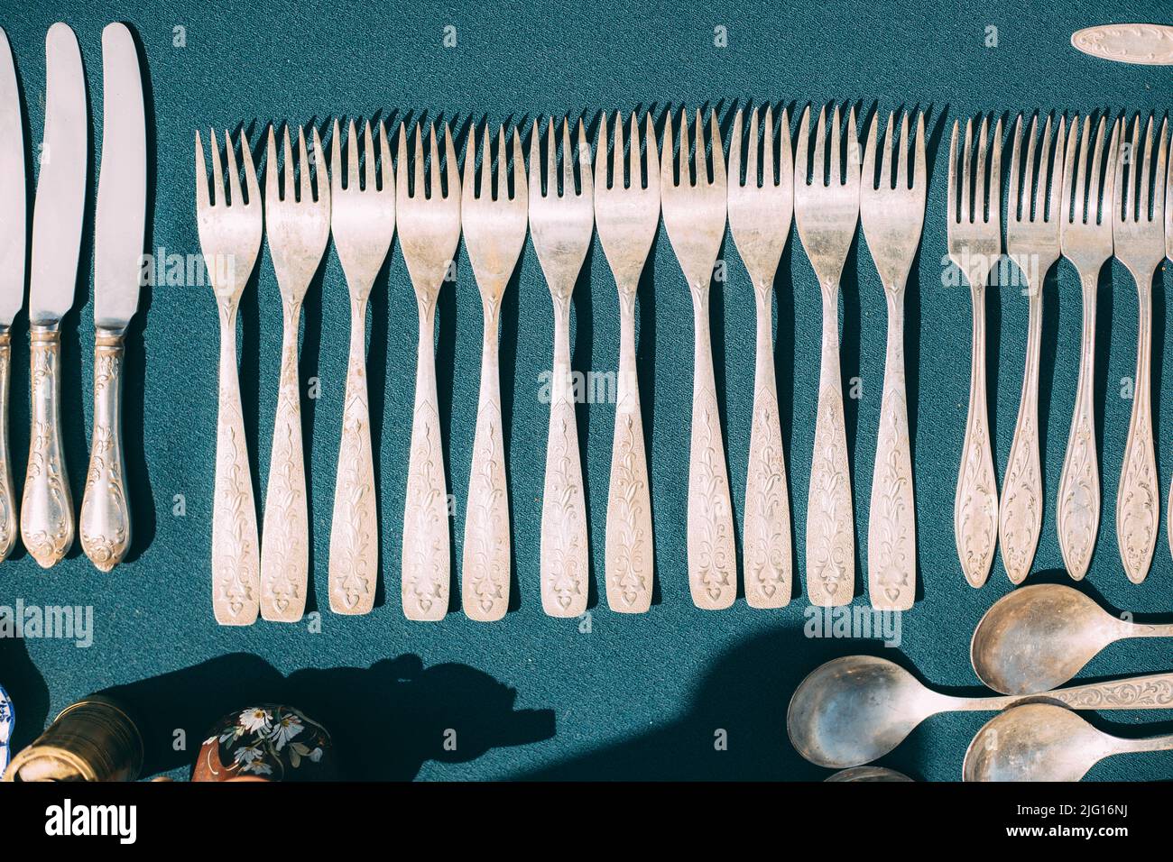 Vintage Forks On Tablecloth. Kitchenware. Set Of Old Kitchen Utensils