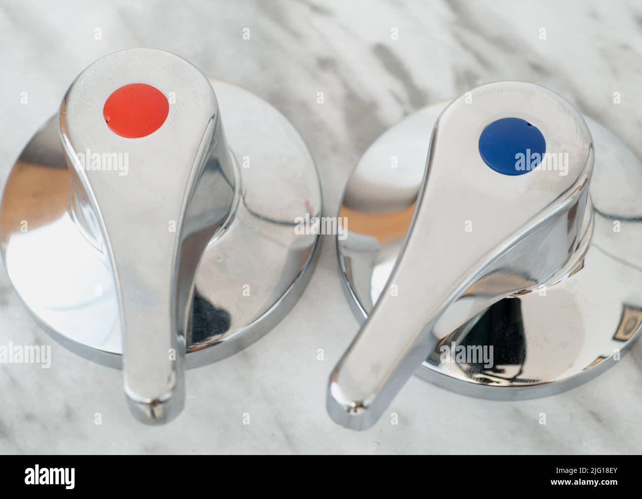 Shower Taps, Wasserhan, With Red And Blue Dots. Hot Water Is No Longer A Matter Of Course And Is