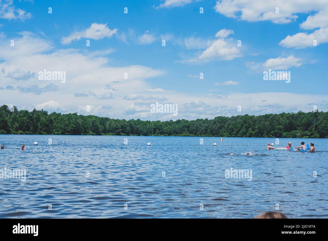 Vacationers enjoy time at Lake Jean, Rickets Glen State Park, Northern Pennsylvania - Stock Image
