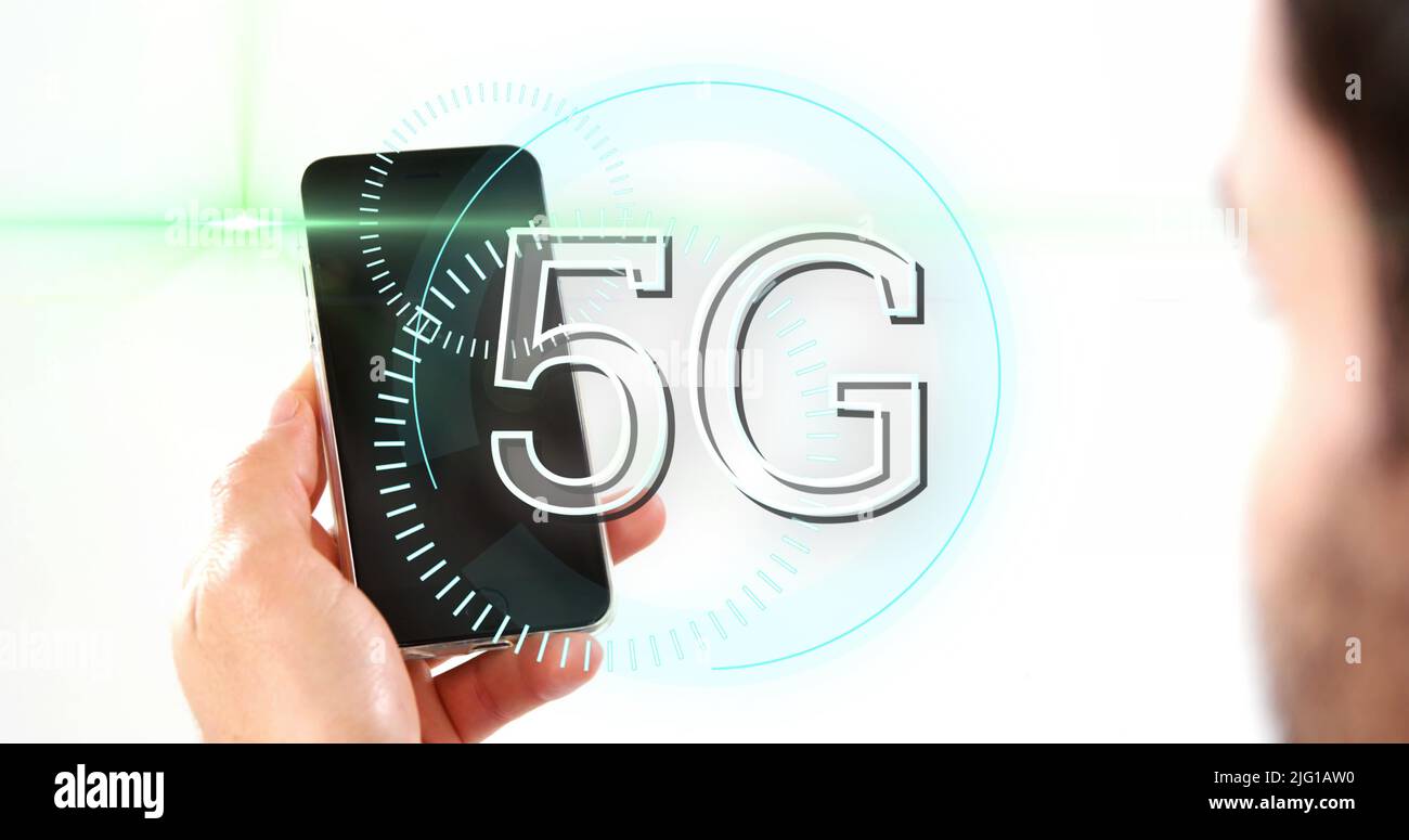5G text on circles against man using smartphone Stock Photo