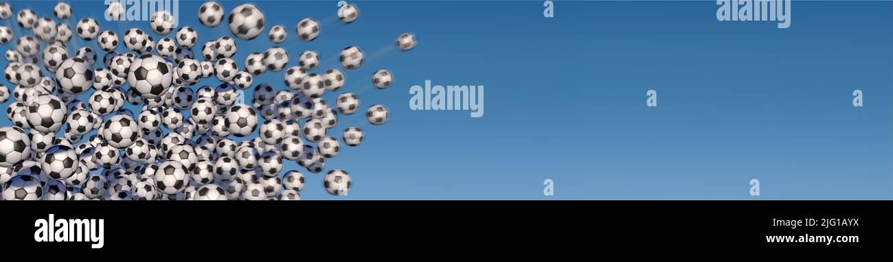 Flying soccer balls against a blue sky Stock Photo