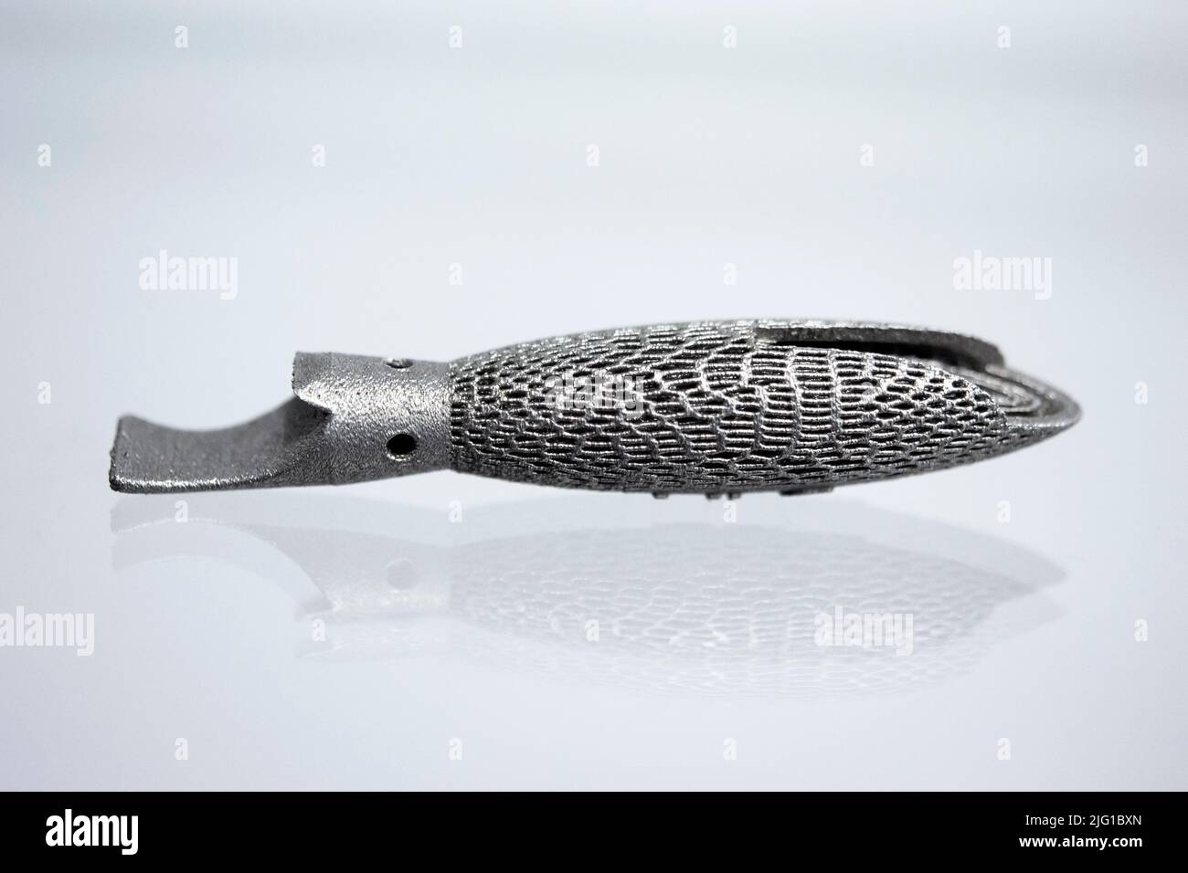 Model printed on 3D printer for metal close-up . Three-dimensional model printed on metal 3D printer. Model printed laser sintering machine for metal. Form printed by selective laser melting Stock Photo