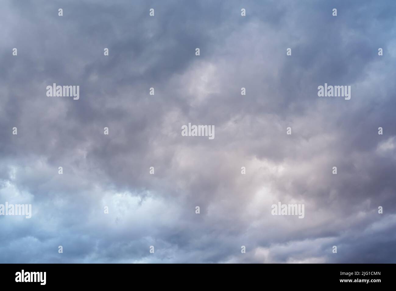 Evening sky with dark heavy clouds - as if storm coming Stock Photo - Alamy